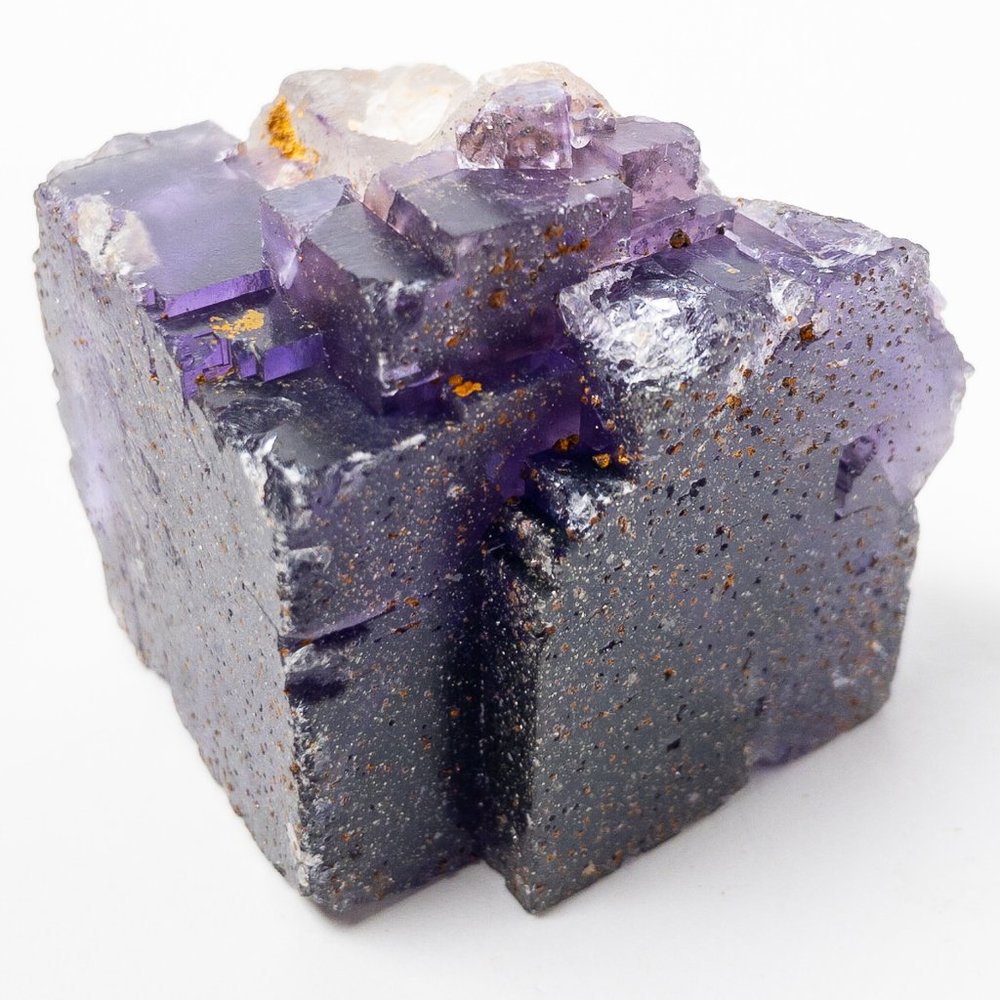 Large dark purple fluorite crystal cube with pyrite inclusions from Illinois